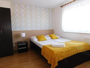 Łóżko lub łóżka w pokoju w obiekcie Family Homes - Dom Wakacyjny EDA