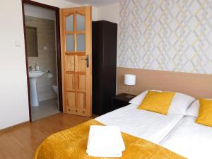 Łóżko lub łóżka w pokoju w obiekcie Family Homes - Dom Wakacyjny EDA