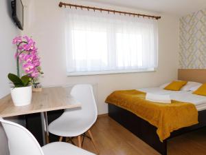 Łóżko lub łóżka w pokoju w obiekcie Family Homes - Dom Wakacyjny EDA
