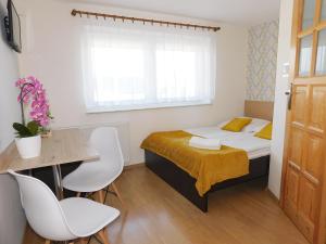 Łóżko lub łóżka w pokoju w obiekcie Family Homes - Dom Wakacyjny EDA