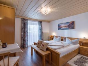 Łóżko lub łóżka w pokoju w obiekcie Appartement Traumblick