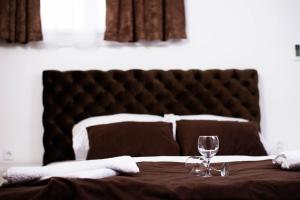 Rúm í herbergi á Sobe i Apartmani Casa Mia