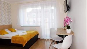 Łóżko lub łóżka w pokoju w obiekcie Family Homes - Dom Wakacyjny EDA