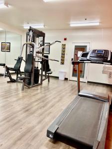 a gym with two treadmills and a treadmill at Siegel Select Flamingo in Las Vegas