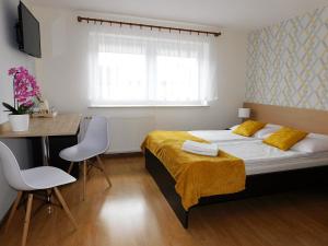 Łóżko lub łóżka w pokoju w obiekcie Family Homes - Dom Wakacyjny EDA