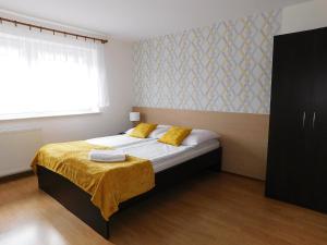 Łóżko lub łóżka w pokoju w obiekcie Family Homes - Dom Wakacyjny EDA