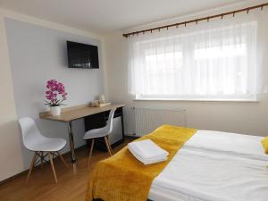 Łóżko lub łóżka w pokoju w obiekcie Family Homes - Dom Wakacyjny EDA