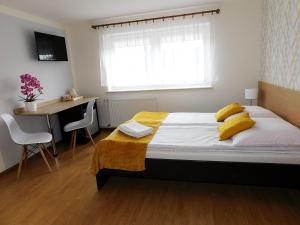 Łóżko lub łóżka w pokoju w obiekcie Family Homes - Dom Wakacyjny EDA