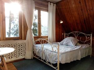 Posteľ alebo postele v izbe v ubytovaní Willa Kasprusie