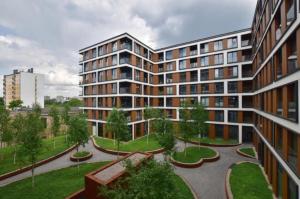 a rendering of a large building with a courtyard at Apartament Active Moon in Lublin