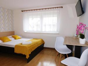 Łóżko lub łóżka w pokoju w obiekcie Family Homes - Dom Wakacyjny EDA