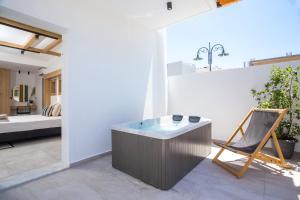 Posteľ alebo postele v izbe v ubytovaní Cactus Suites