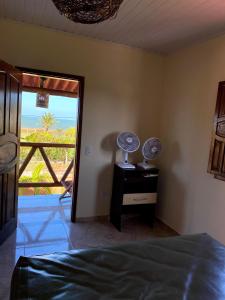 เตียงในห้องที่ Recanto Bela Vista Costa Dourada-BA