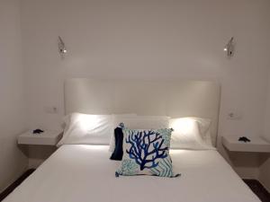Ein Bett oder Betten in einem Zimmer der Unterkunft Las Olas Blue