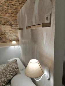 A bed or beds in a room at SALOTUR Sierpes