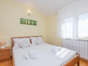 Posteľ alebo postele v izbe v ubytovaní Villa Secret Beauty with Saltwater Pool + 29 fotografií