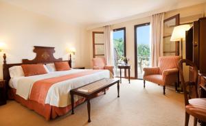 Кровать или кровати в номере Es Moli Hotel