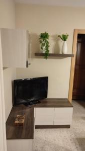 Televízia a/alebo spoločenská miestnosť v ubytovaní Apartamento Paseo Marítimo, Centro Torre del Mar