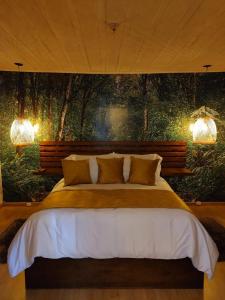 Postel nebo postele na pokoji v ubytování Hotel Vísperas