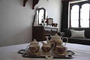 Příslušenství pro přípravu čaje a kávy v ubytování Hotel Petrino