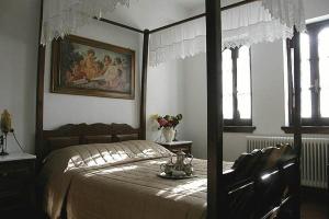 Postel nebo postele na pokoji v ubytování Hotel Petrino