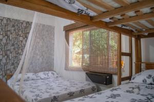 Ένα ή περισσότερα κρεβάτια σε δωμάτιο στο L' Europe