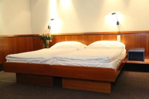 Łóżko lub łóżka w pokoju w obiekcie Prielmayerhof HOTEL
