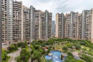 an aerial view of a city with tall buildings at Locals Apartment Inn 01 in Ganzhou