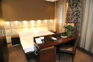 Łóżko lub łóżka w pokoju w obiekcie Prielmayerhof HOTEL