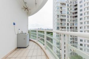 a balcony with a view of a city at Locals Apartment House 01 in Changliu