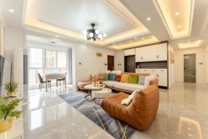 Χώρος καθιστικού στο Locals Apartment Inn 12