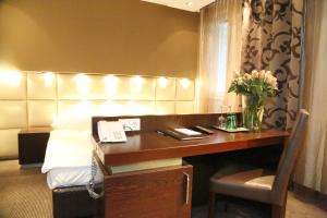 Łóżko lub łóżka w pokoju w obiekcie Prielmayerhof HOTEL