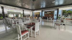 Restorāns vai citas vietas, kur ieturēt maltīti, naktsmītnē LPP Convention Hotel Demangan