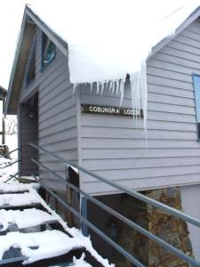 a building with icicles hanging off the side of it at Cobungra in Mount Hotham