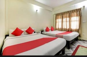 Uma cama ou camas num quarto em Hotel The Lake