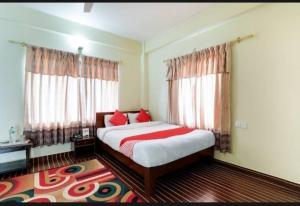 Uma cama ou camas num quarto em Hotel The Lake