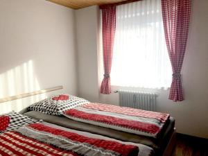 En eller flere senger på et rom på Appartement Nr 19, Alpenappartementhaus, Oberstaufen-Steibis, Allgäu