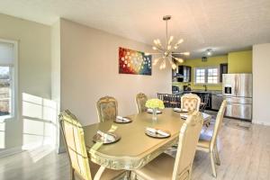 a dining room with a table and chairs at Harrisonburg Retreat with Hot Tub about 2 Mi to JMU in Harrisonburg