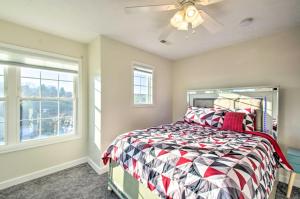 a bedroom with a bed and a ceiling fan at Harrisonburg Retreat with Hot Tub about 2 Mi to JMU in Harrisonburg