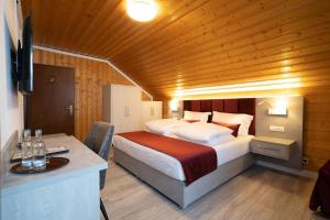 Postel nebo postele na pokoji v ubytování Landgasthof Göbel