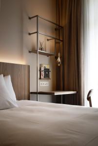 Ένα ή περισσότερα κρεβάτια σε δωμάτιο στο Sorell Hotel Zürichberg