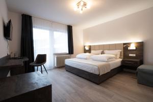 Postel nebo postele na pokoji v ubytování Landgasthof Göbel