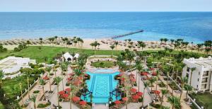 an aerial view of a resort with a pool and the beach at Pickalbatros The Palace Port Ghalib in Port Ghalib