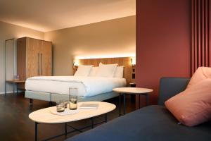 Ένα ή περισσότερα κρεβάτια σε δωμάτιο στο Sorell Hotel Zürichberg