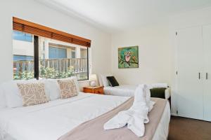 Ένα ή περισσότερα κρεβάτια σε δωμάτιο στο Town Centre Location with Stunning View - Unit 1