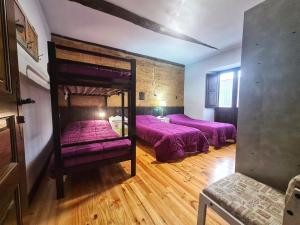 Posteľ alebo postele v izbe v ubytovaní Albergue El Encanto