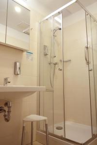 חדר רחצה ב-Hotel Astoria