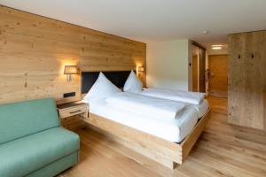 En eller flere senge i et værelse på Brauereigasthof Schäffler