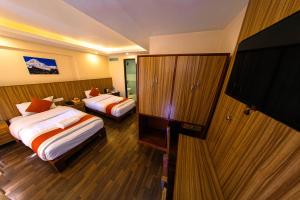 Voodi või voodid majutusasutuse Hotel Chhimeki toas