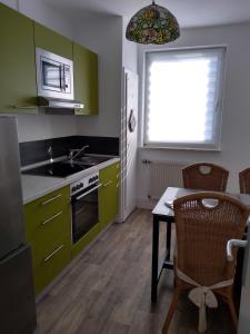 Virtuvė arba virtuvėlė apgyvendinimo įstaigoje Haus Christoffel Wieda
